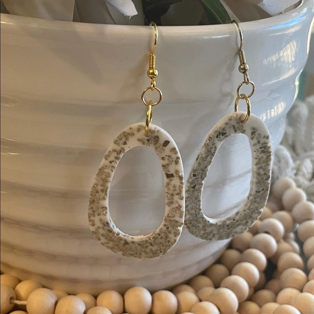 White and gold dangle